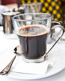 Fototapeta Sawanna - wonderful white cup of hot coffee on table