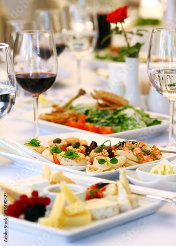 Fotografie, Obraz Different snacks for wine on banquet table