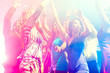 © Kzenon - Party people dancing in disco or club