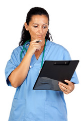 Wall Mural - Happy doctor woman with clipboard thinking