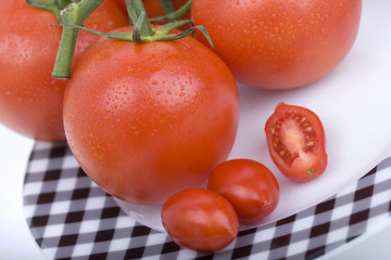 Fresh  tomatoes on a plate