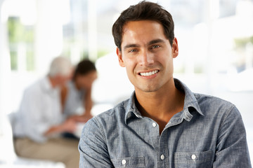 Wall Mural - Hispanic businessman in office