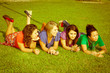 © william87 - Teenage Female Friends Lying on Green at Park