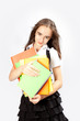 © Natalya Antoshchenko - schoolgirl holds books