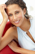 © Monkey Business - Young woman sitting in chair