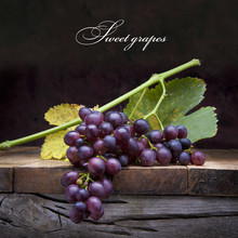 Art Purple Grapes  On Old Wooden Background