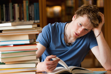 Poster - Tired man with a book