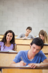 Poster - Portrait of students during a lecture