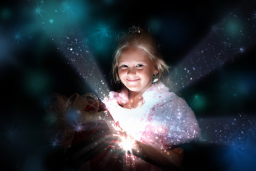 Wall Mural - Child opening a magic gift box