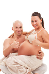 Wall Mural - Happy pregnant woman with her husband