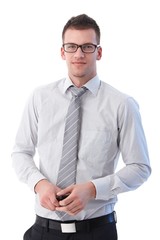 Young businessman smiling