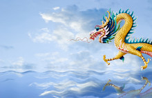 Golden Dragon Flying Over The Sea With Nice Sky Background