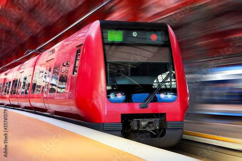 Naklejka - mata magnetyczna na lodówkę Modern high speed train with motion blur