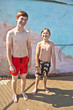 © travelview - brothers have fun in the pool area