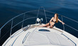 © Uryadnikov Sergey - Girl relaxing on a yacht.
