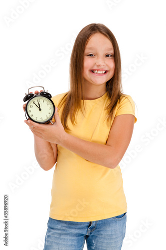 Fotografie, Obraz Girl holding alarm-clock isolated on white background