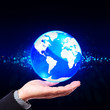 © SuriyaPhoto - Hand holding crystal globe, Save world concept