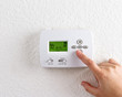© Mariusz Blach - digital thermostat with finger