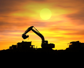 Heavy earth mover in sunset