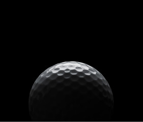 Golf ball on black background with copy space