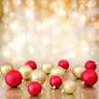 Christmas baubles on defocused lights background