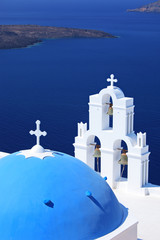 Wall Mural - Blue dome Church St. Spirou in Firostefani on the island of Sant