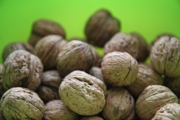 Walnuts green background