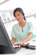 © goodluz - Portrait of beautiful nurse with headset on