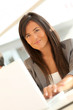 © goodluz - Portrait of beautiful businesswoman at work