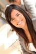 © goodluz - Portrait of beautiful businesswoman at work