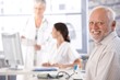 © nyul - Elderly man waiting for examination smiling