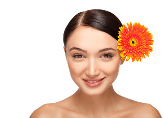 Portrait of beautiful  woman with a flower