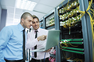 Wall Mural - it engineers in network server room