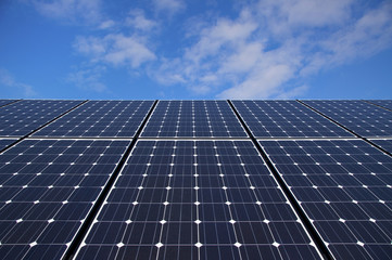 Wall Mural - solar panels against blue sky