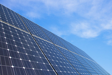 Wall Mural - solar panels against blue sky