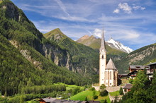 Heiligenblut Church In Front Of Grossglockner Peak, Austria