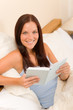 © CandyBox Images - Bedroom - young woman read book in bed