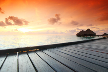 maldivian houses on sunrise