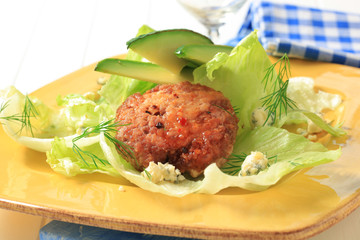 Poster - Meat patty on lettuce leaves