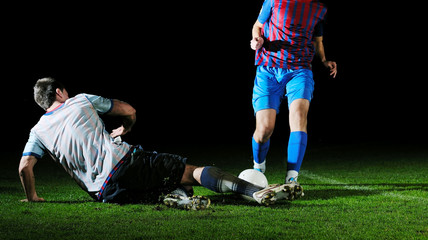 Wall Mural - football players in competition for the ball