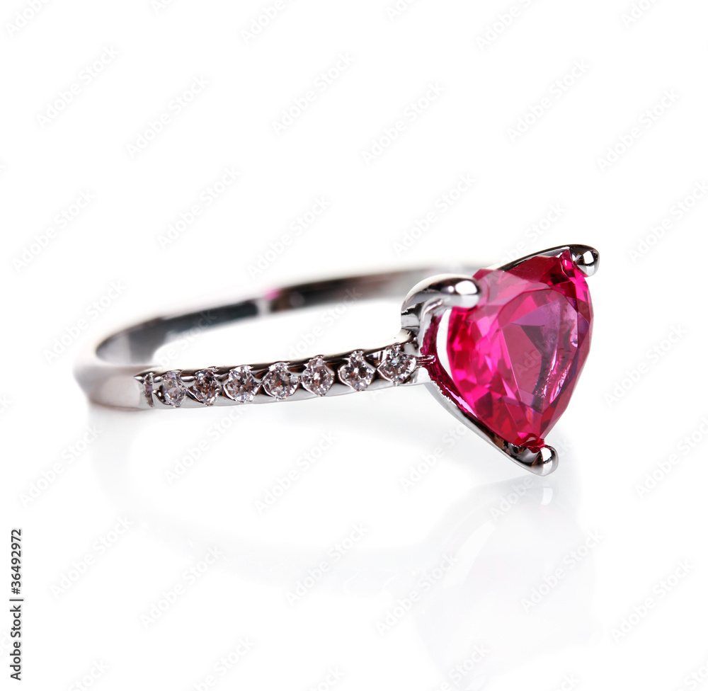 beautiful ring with  red gem isolated on white