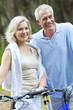 © Darren Baker - Happy Senior Man & Woman Couple Cycling Bicycles