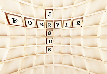 jesus forever lettering arranged as a cross