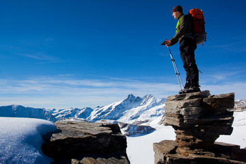 Poster - Young man in the mountains enjoying the view