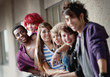 © Scott Griessel - A group of punk rock teens smile at the camera with focus on the
