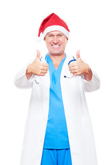 doctor in red santa hat showing thumbs up