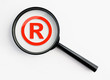 magnifying glass with registered trademark