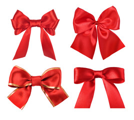 Wall Mural - set of red gift satin ribbon bows on white background