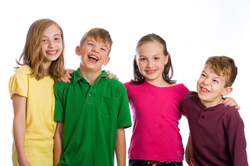 Wall Mural - Group of happy kids with colorful shirts on