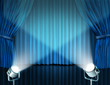 © freshidea - Spotlights on blue velvet cinema curtains